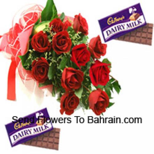 12 Hermosas Rosas Rojas con Chocolates Cadbury