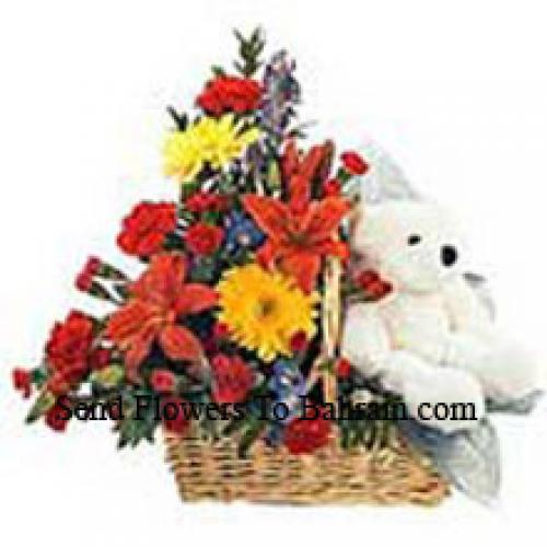 Canasta de flores surtidas con osito de peluche